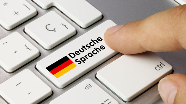 Tastatur mit Entertaste, auf der Deutsche Sprache steht