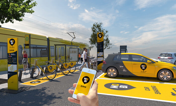 Zu sehen ist das gezeichnete Modell eines intermodalen, so genannten MOBIpunkts in Dresden, an dem man das Verkehrsmittel wechseln kann, so zum Beispiel von Bahn und Bus zu Fahrrad oder Auto.